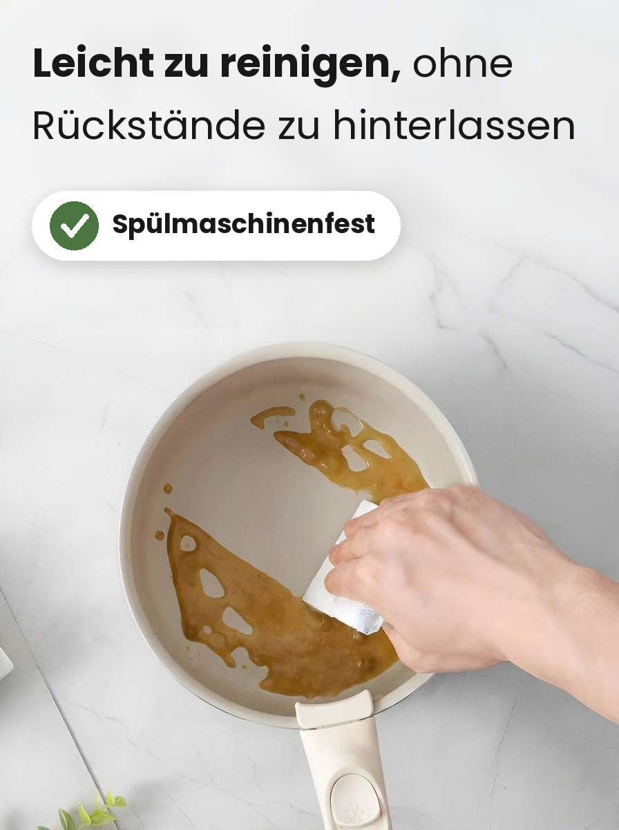 Ellis Küche Pfanne wird mit einem Tuch ausgewischt